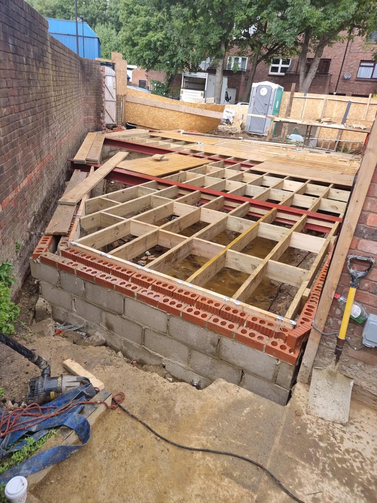 Ground-floor joists laid over the new blockwork