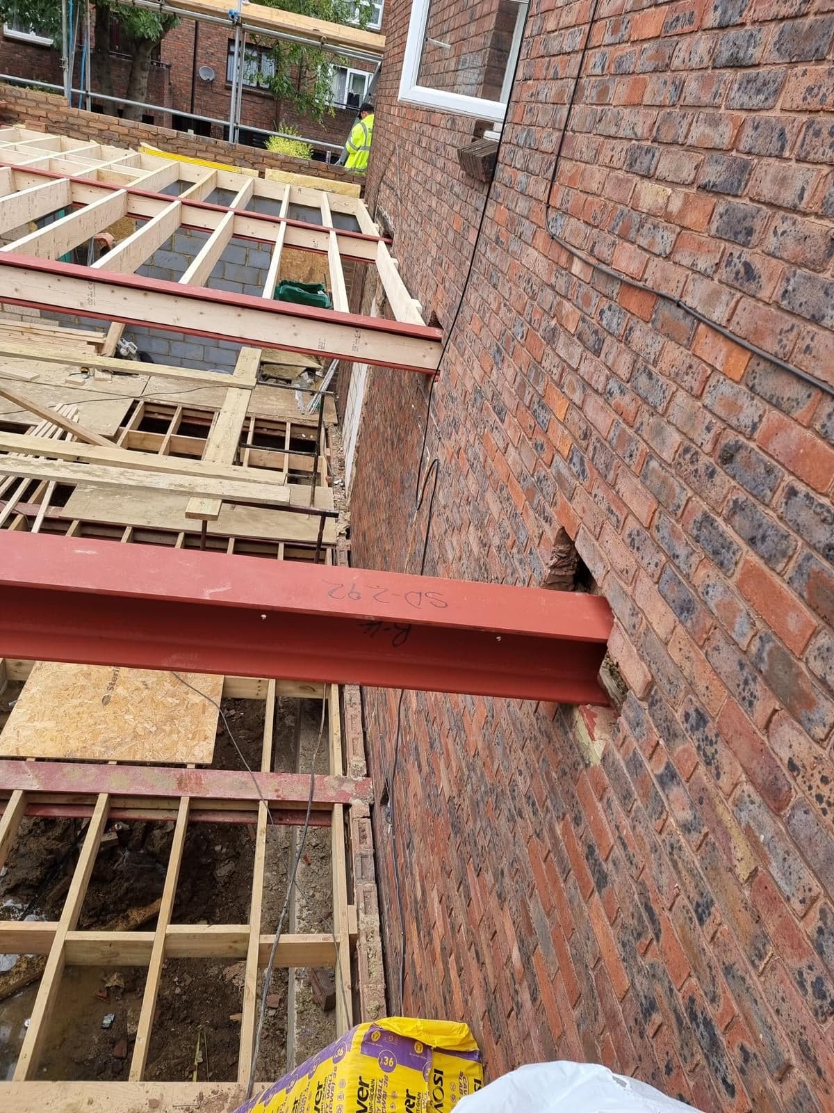 Steel beam and timber joists going in for the first floor